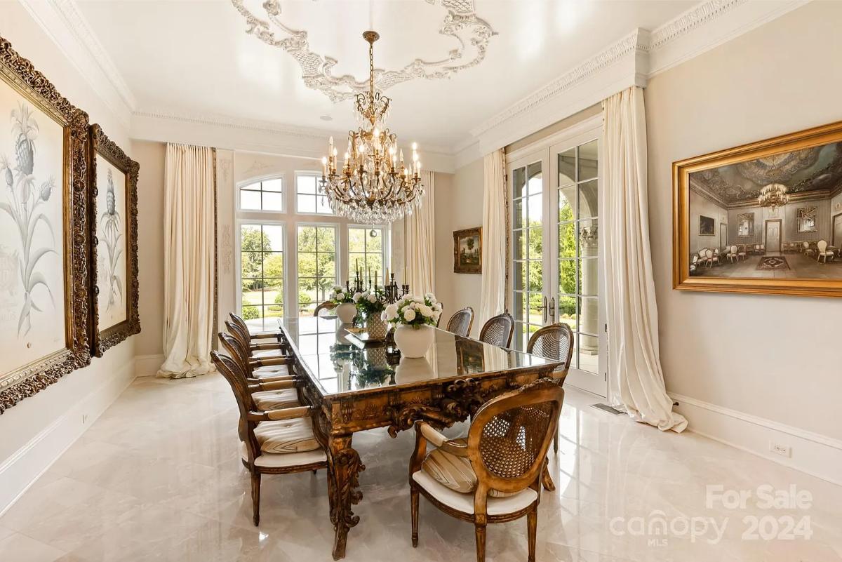 Dining room with a chandelier.