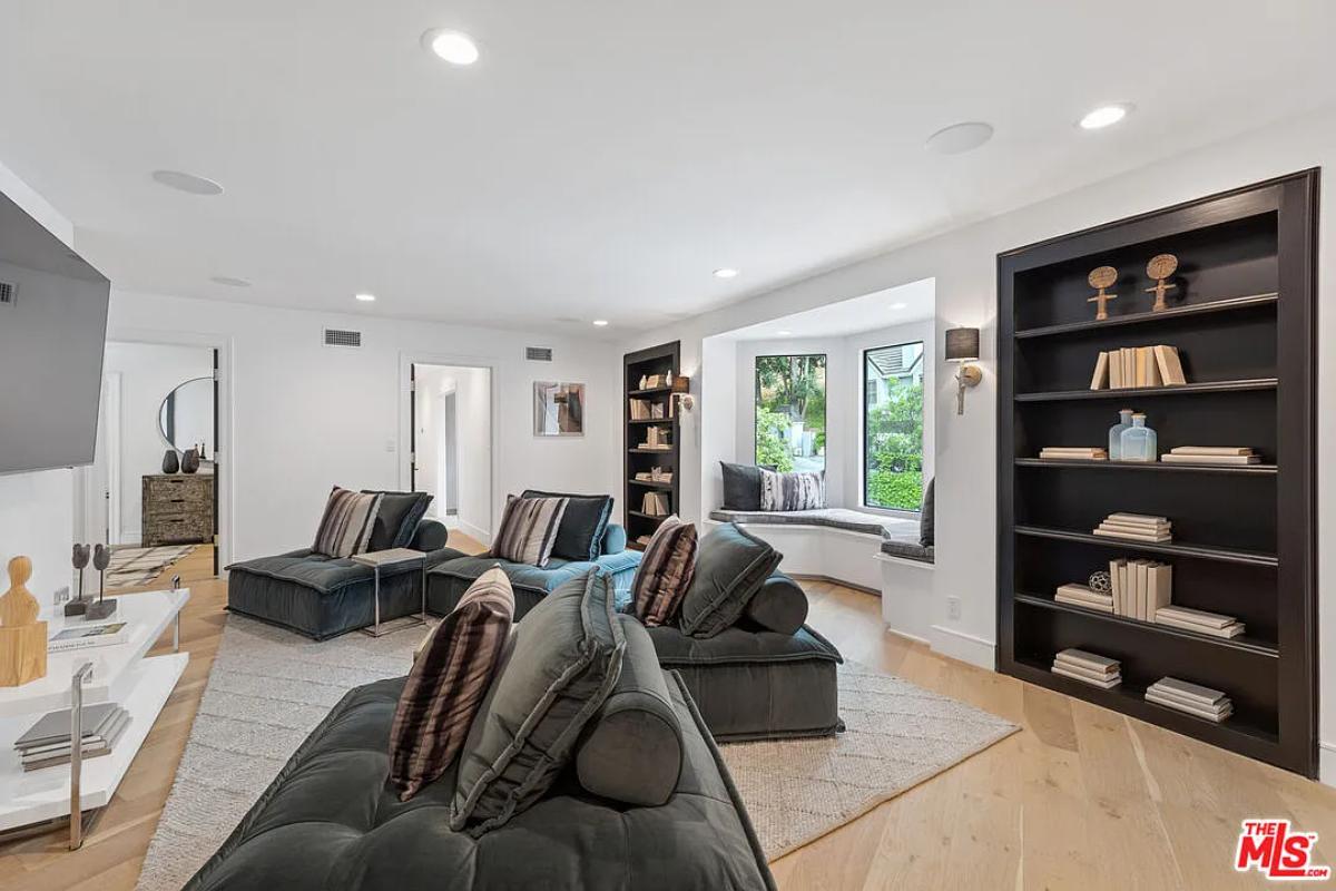 Media room with a large TV.