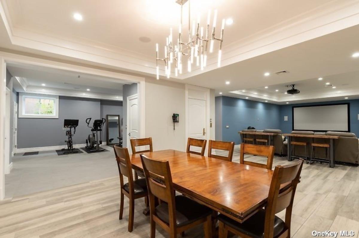 Dining room with a chandelier.
