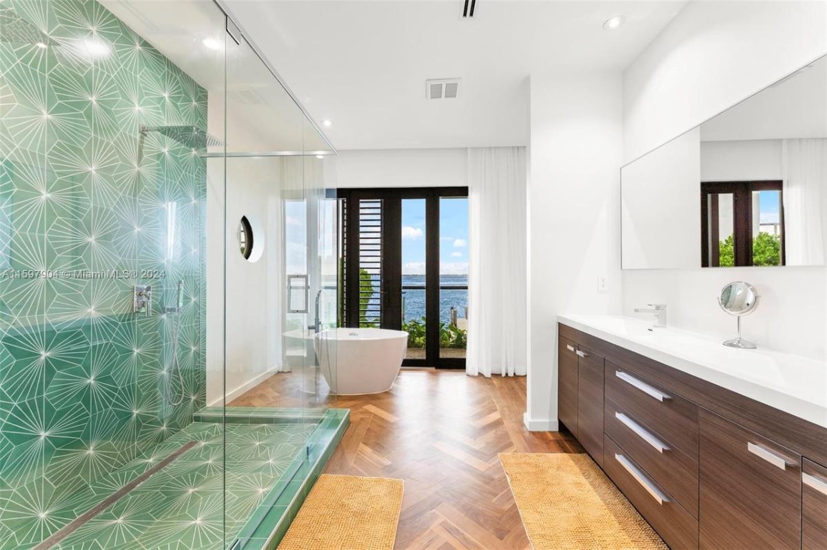 Bathroom with a soaking tub and a walk-in shower.