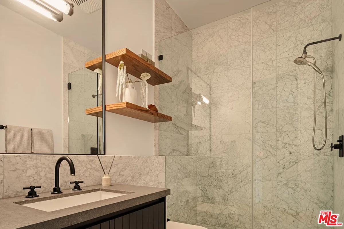 Bathroom with a walk-in shower.