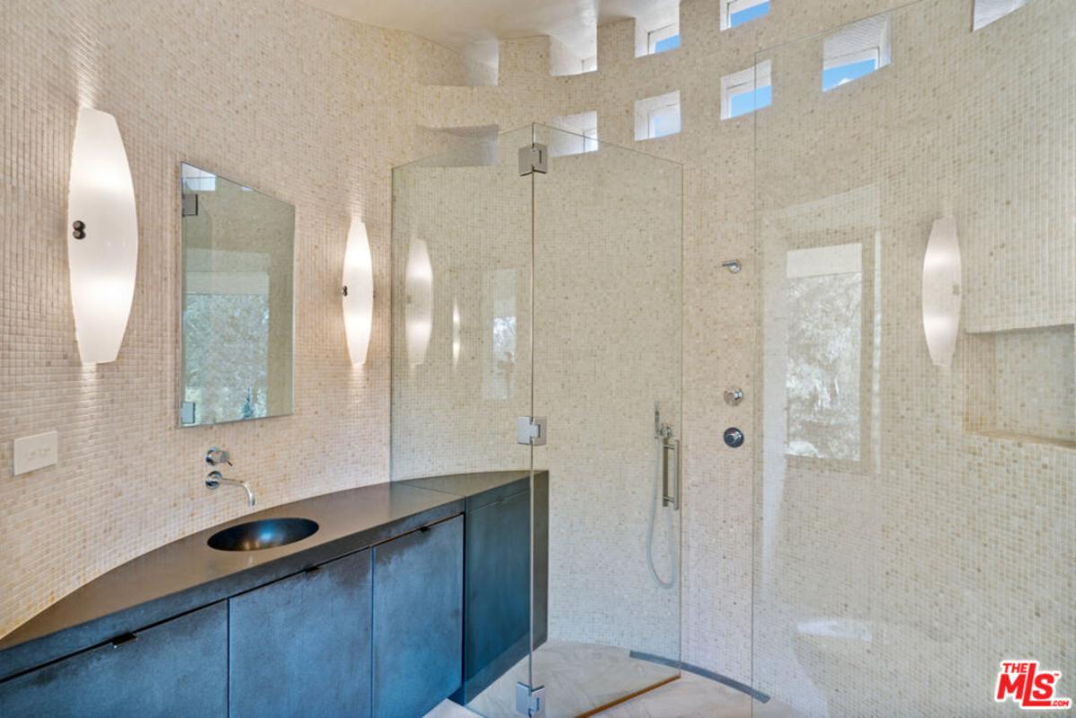 Bathroom with a walk-in shower.
