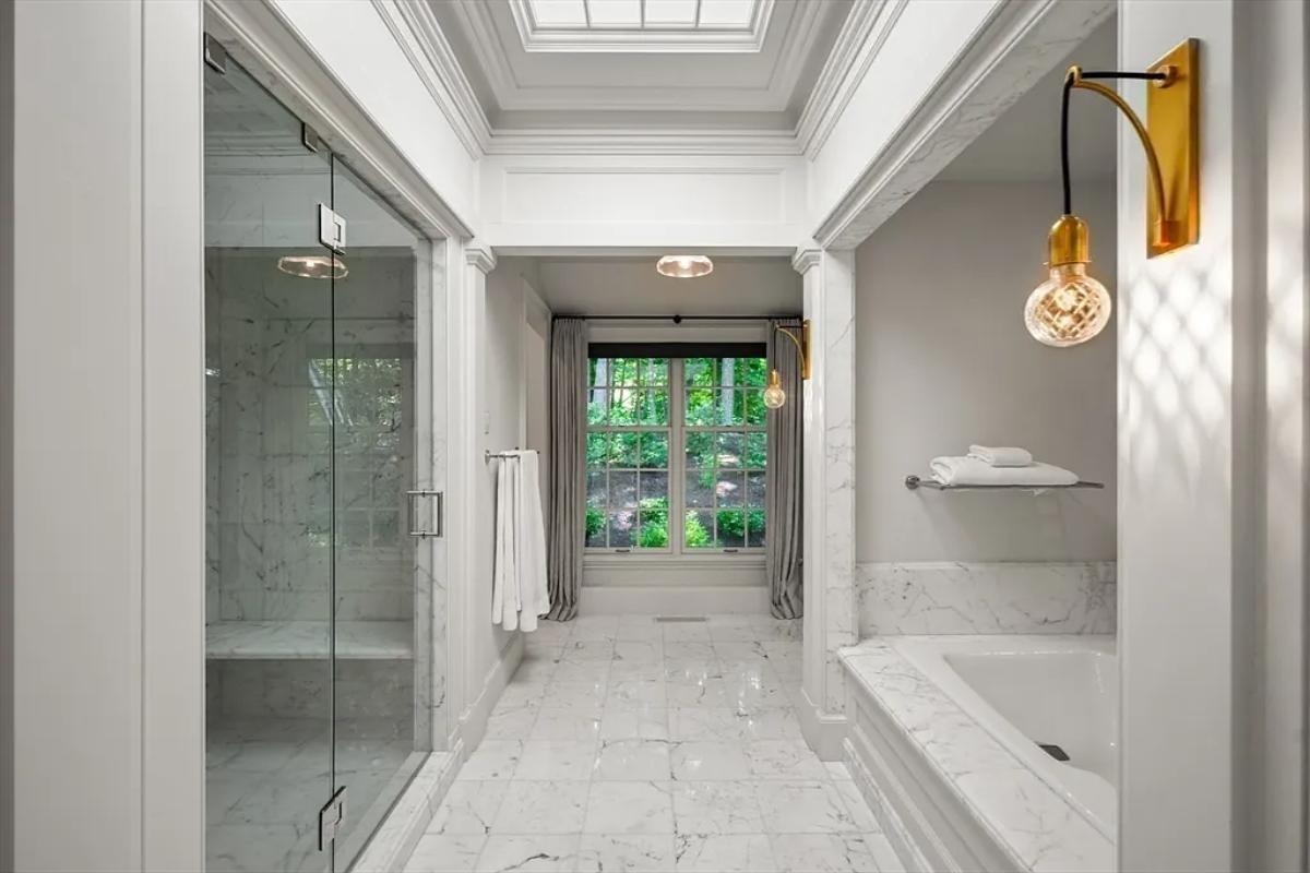 Bathroom with a soaking tub and a walk-in shower.