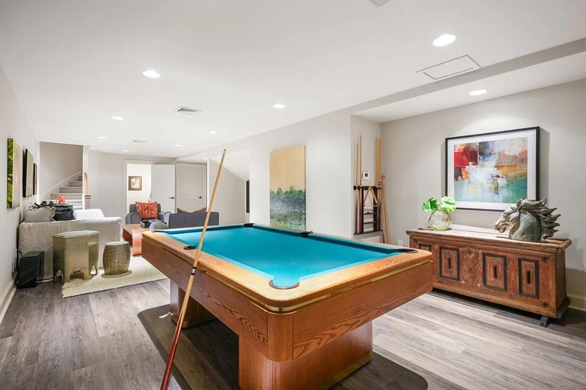 Recreation room with a pool table.