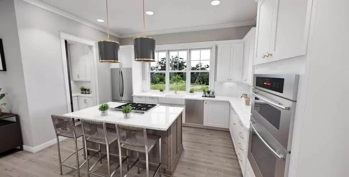 Kitchen with white cabinetry, slate appliances, and a cooktop island.