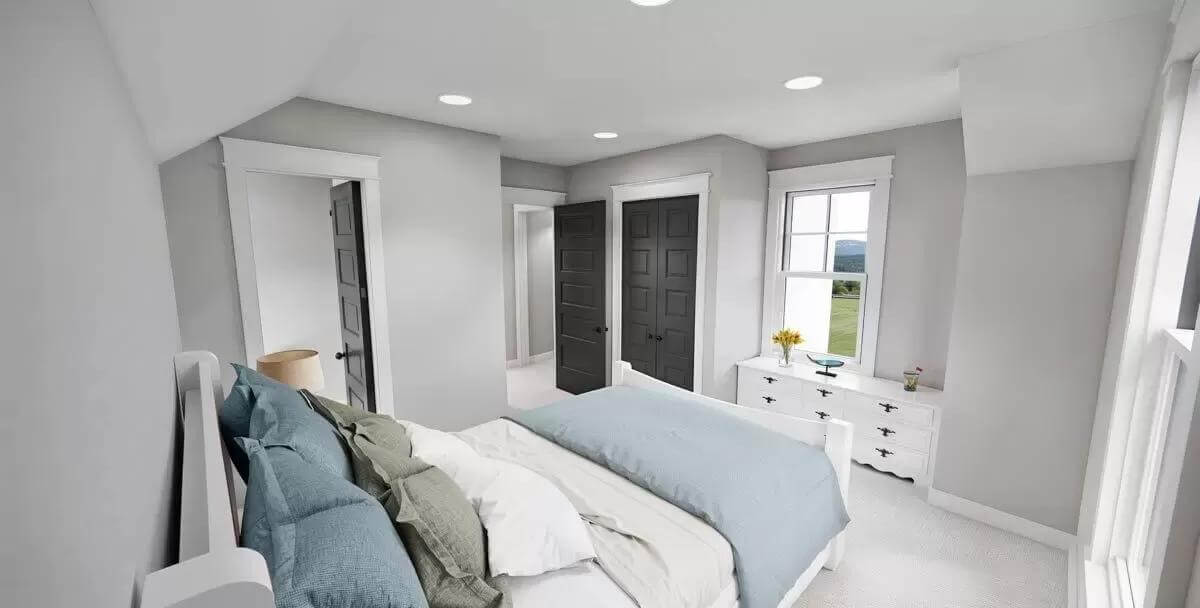 Bedroom with a white dresser and a matching bed over the carpeted floor.