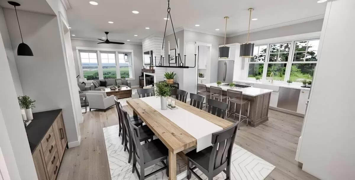 Dining area with a wrought iron chandelier and a rustic dining set over the patterned area rug.