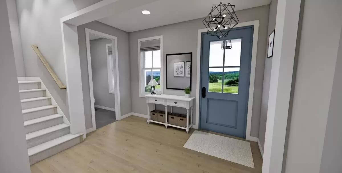 Foyer with a glazed front door and a white console table.