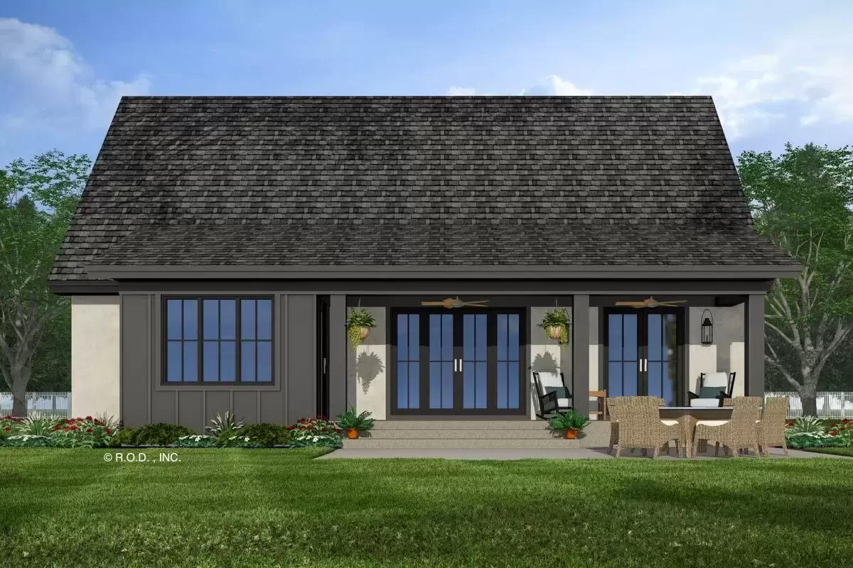 Rear view with a covered porch and a concrete patio.