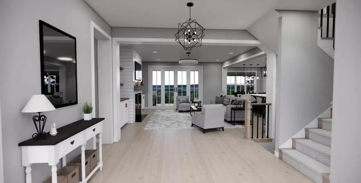 Foyer with a console table and a view of the open living space.