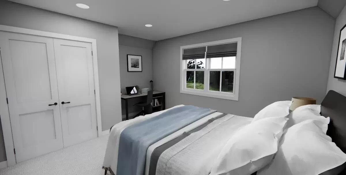 Bedroom with a dark wood desk and a built-in wardrobe.