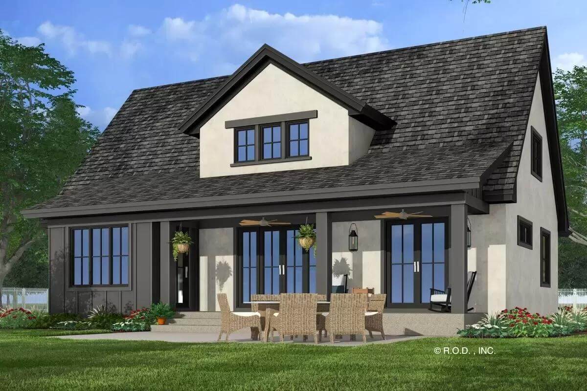 Rear view with a covered patio topped by a gable dormer.