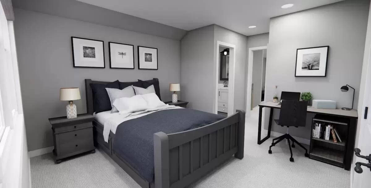 Bedroom with a black bed and an iron desk.