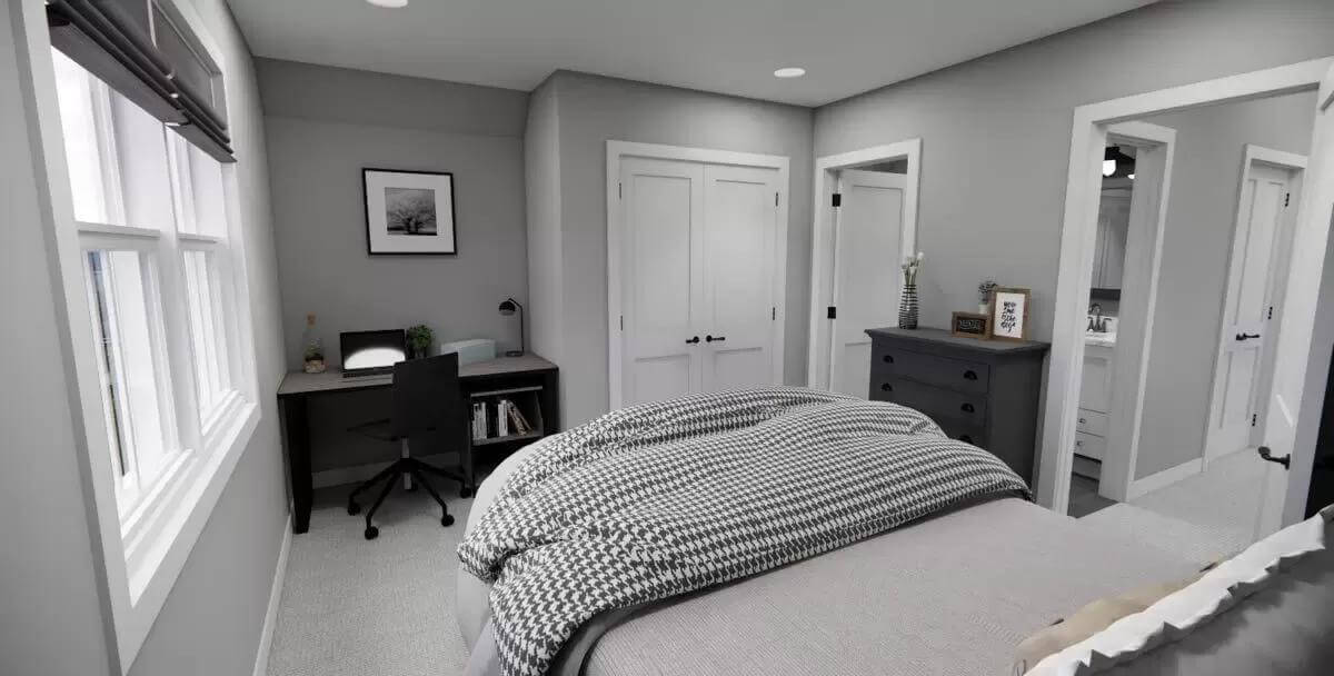 Bedroom with a dark wood desk and a built-in wardrobe.
