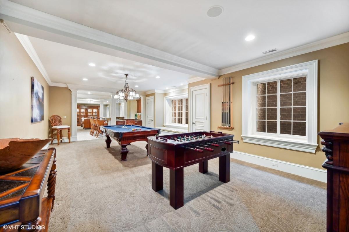 Recreation room with a pool table.