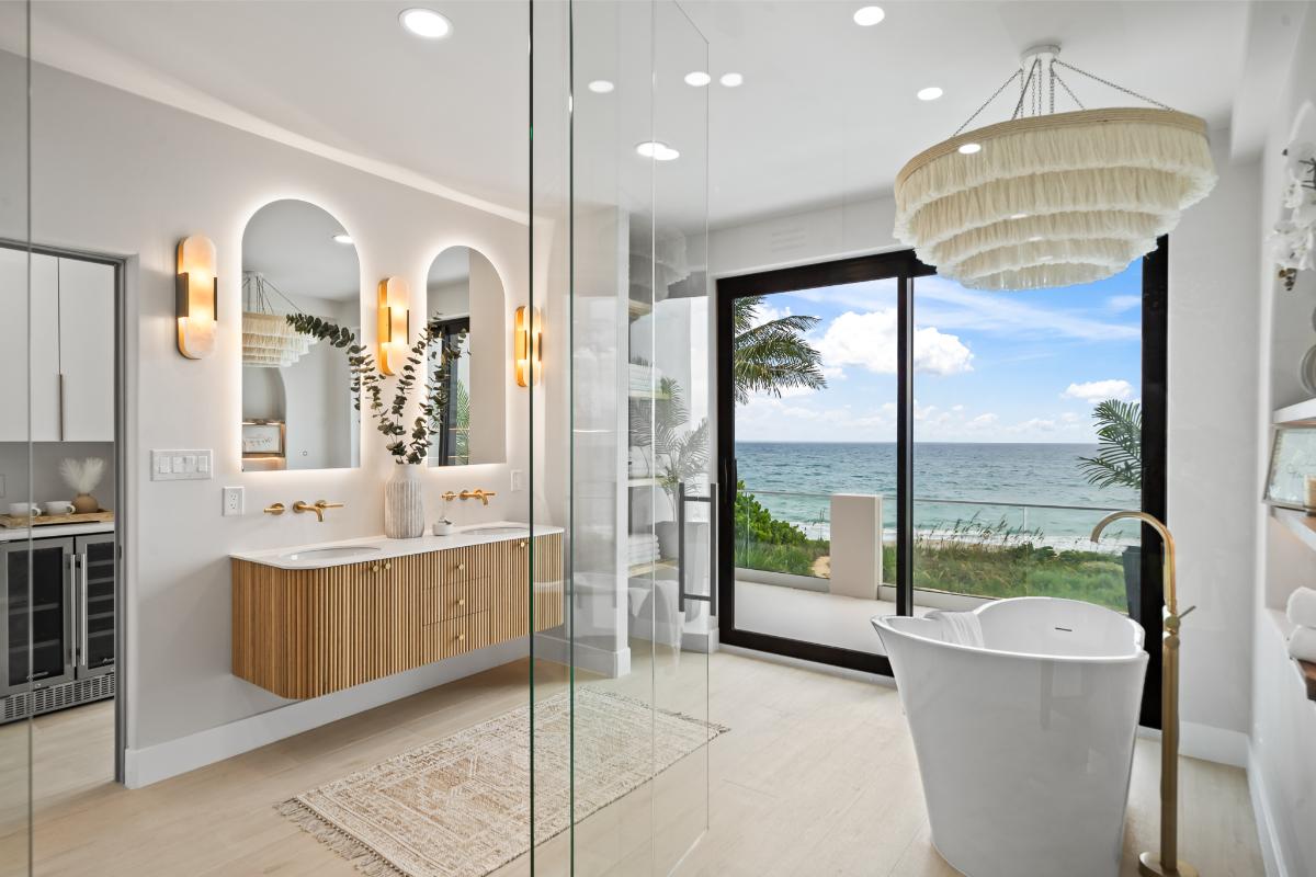 Bathroom with a custom-made vanity and a soaking tub.