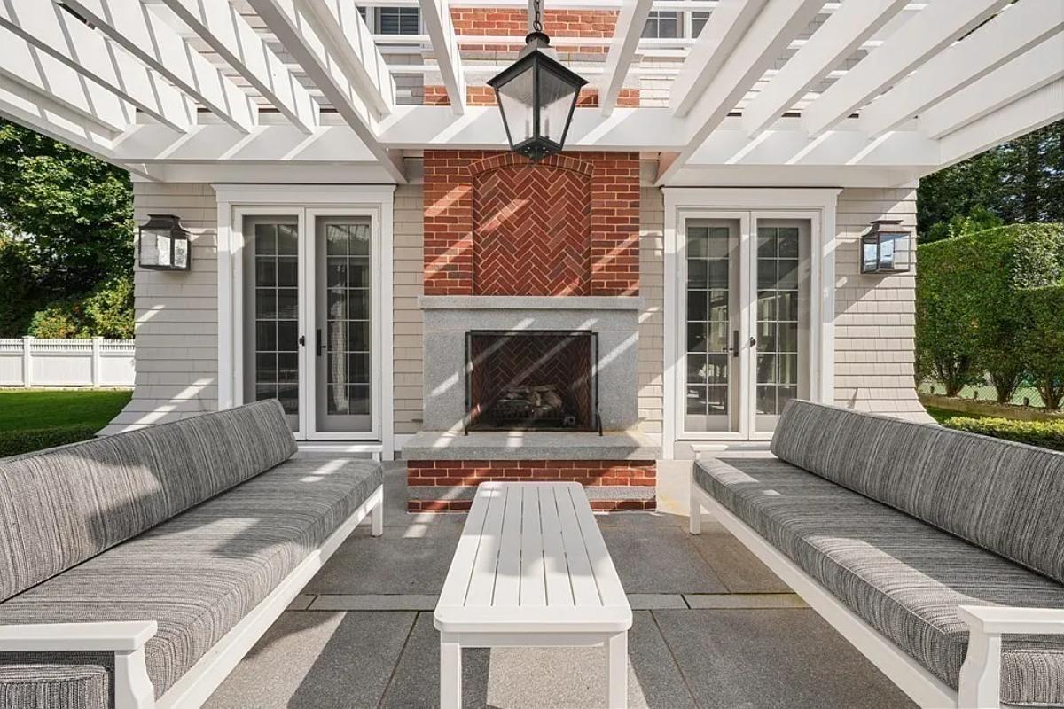 Guest house with an outdoor fireplace.