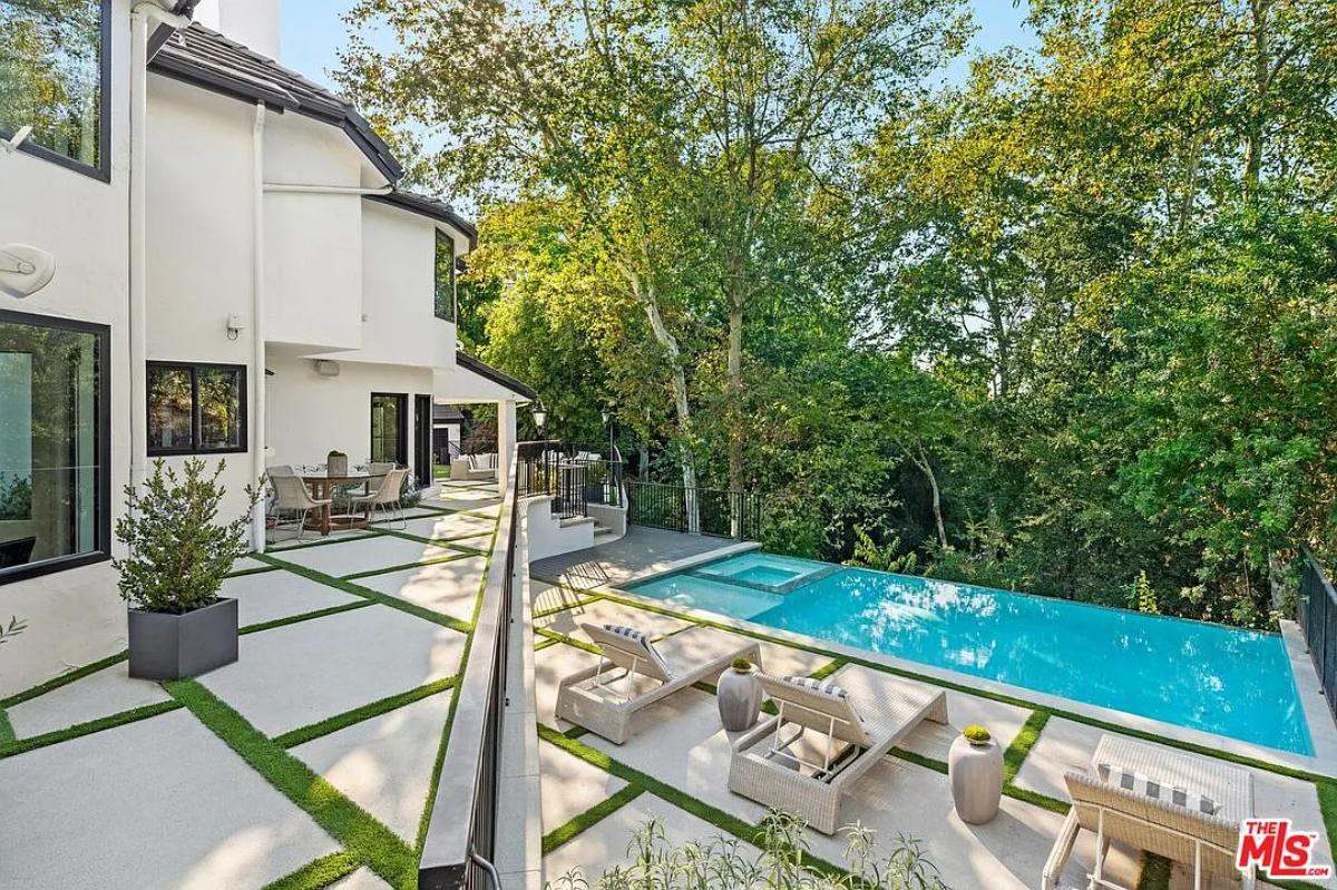 Pool with lounge chairs.