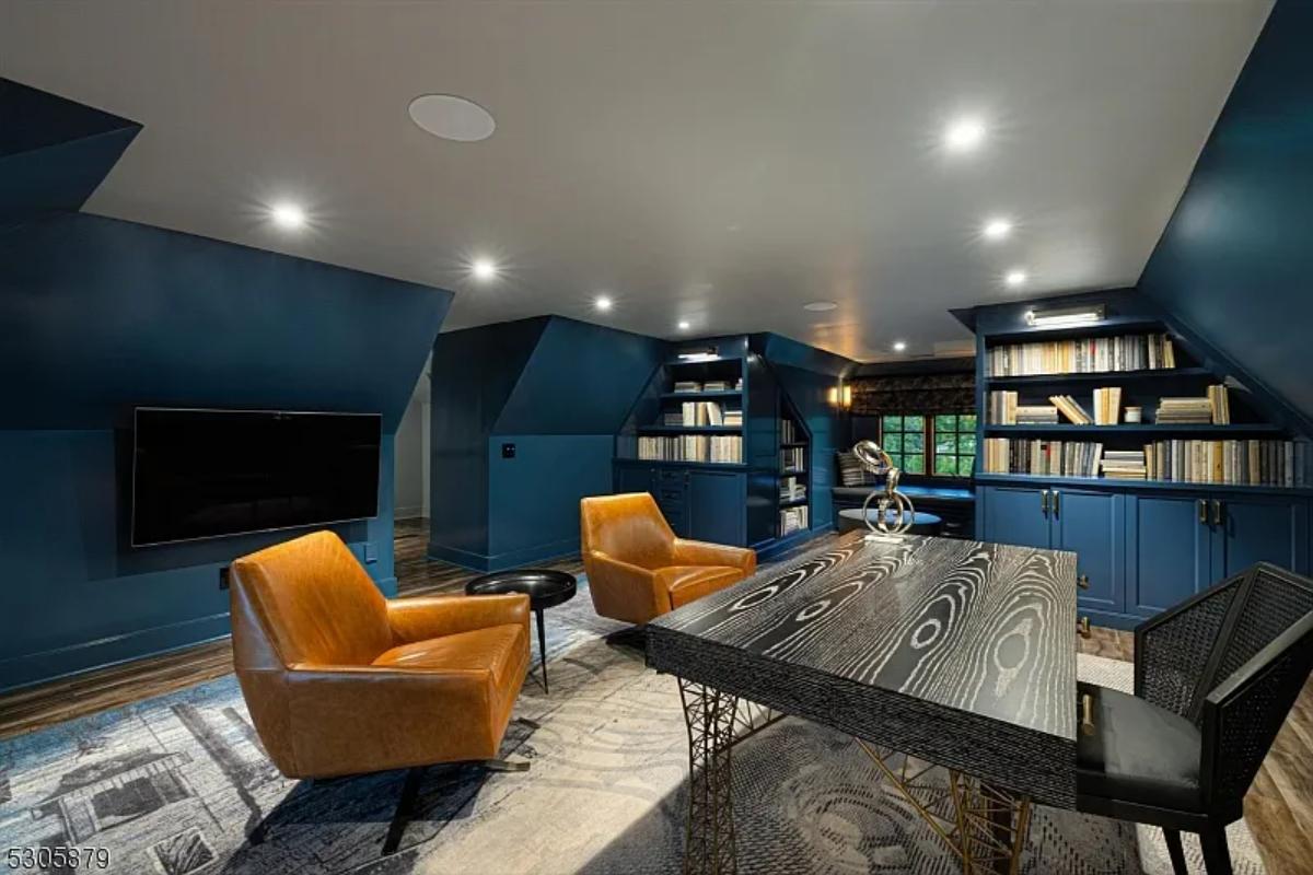 Home office with bookshelves.