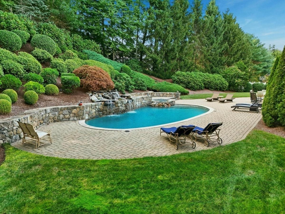 Pool with lounge chairs.
