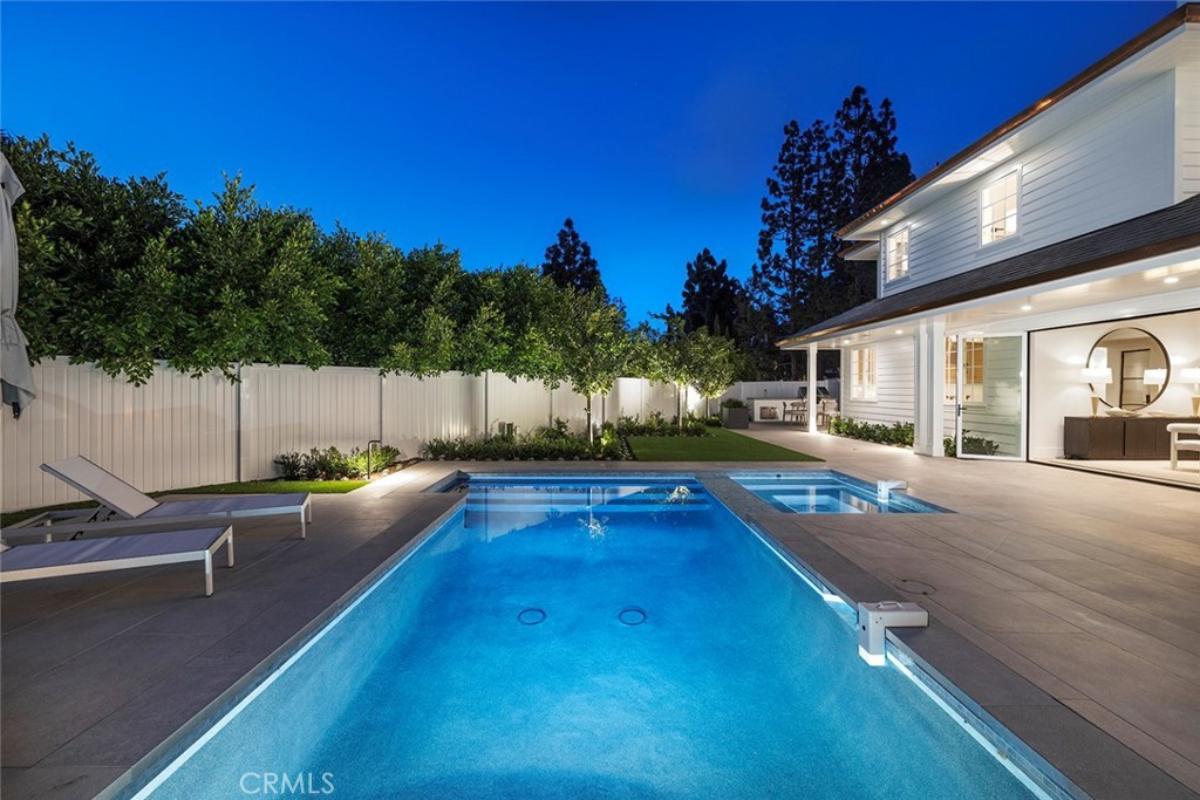 Pool with lounge chairs.