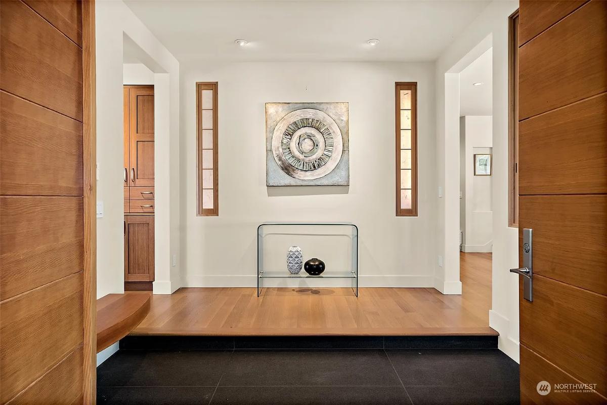 Foyer with hardwood doors.