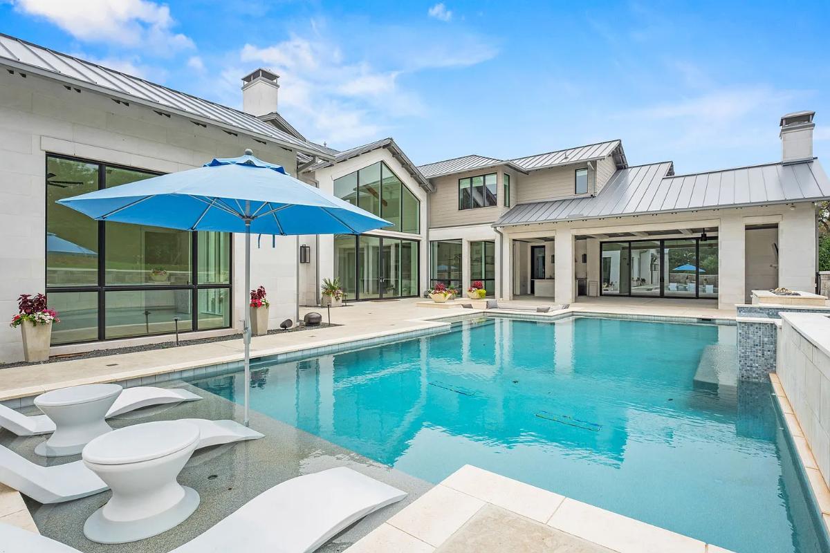 Pool with lounge chairs.