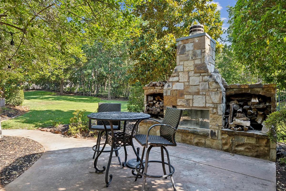 Patio with a fireplace.