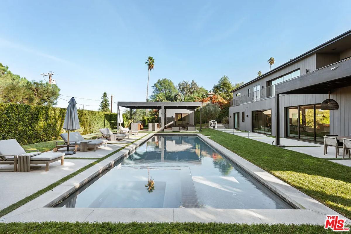 Pool with lounge chairs.