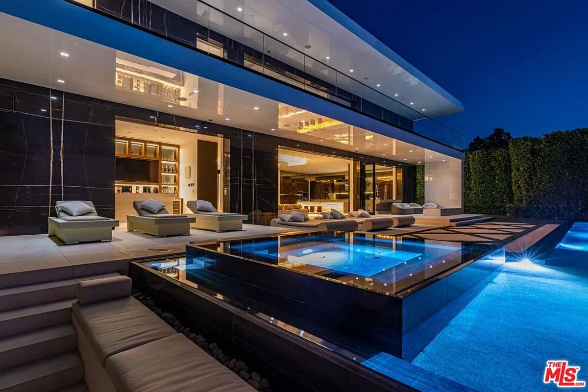Pool with lounge chairs.