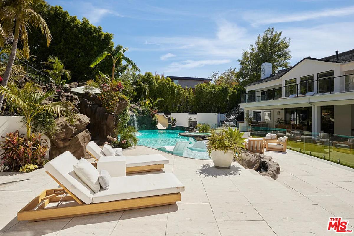 Pool with lounge chairs.