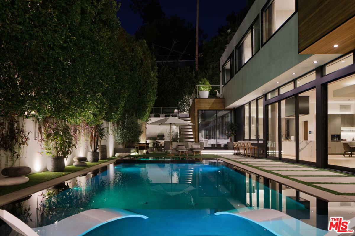 Pool with lounge chairs.