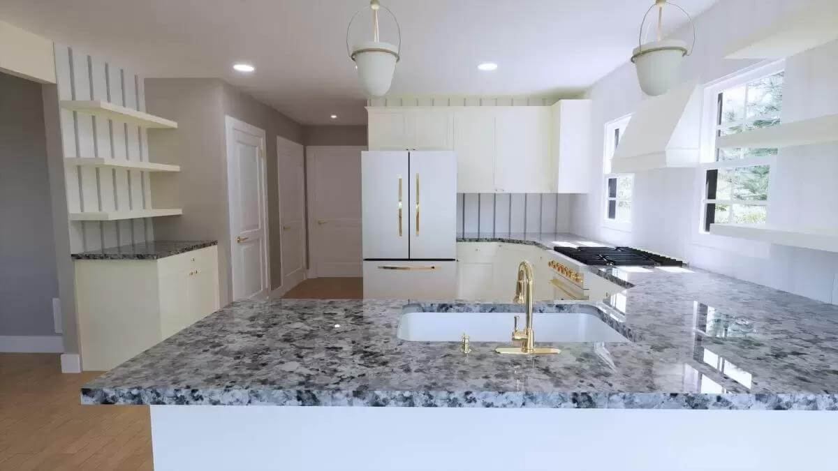 Kitchen with white cabinets, granite countertops, and a peninsula bar with a prep sink.