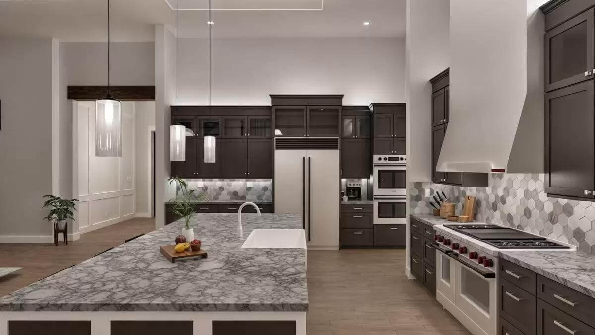 Kitchen with dark wood cabinets and a large island fitted with a farmhouse sink.