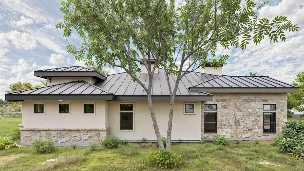 Right view with standing seam metal roofs and sleek windows.