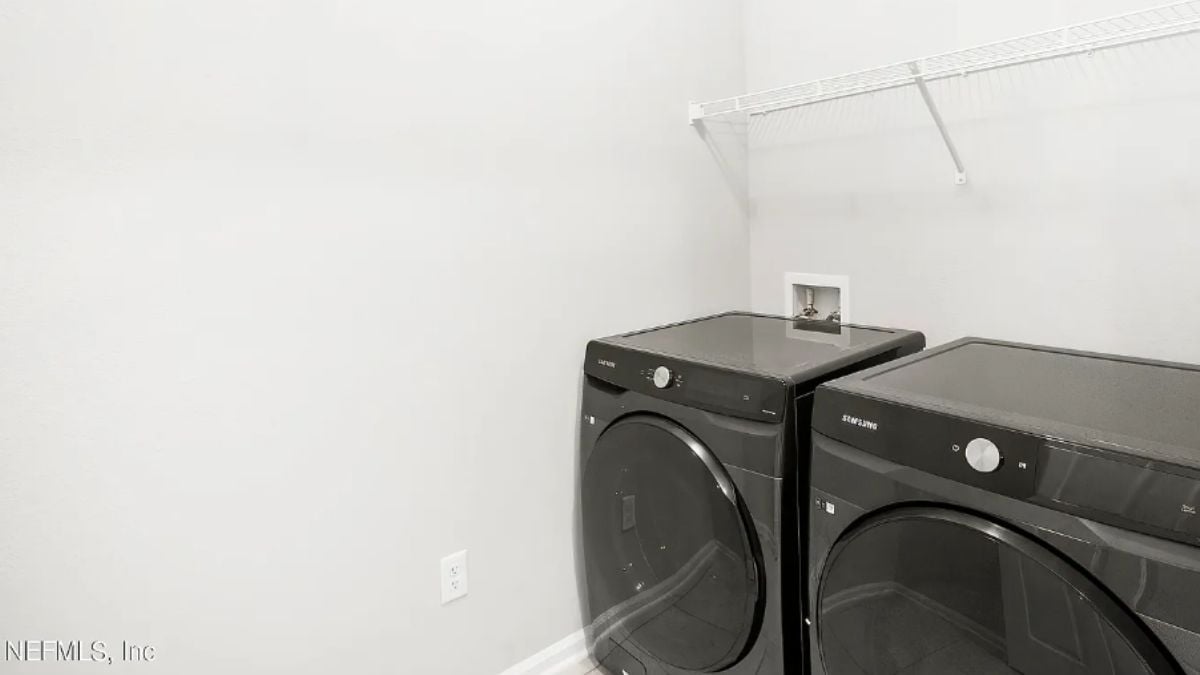 A laundry room with washing machines.