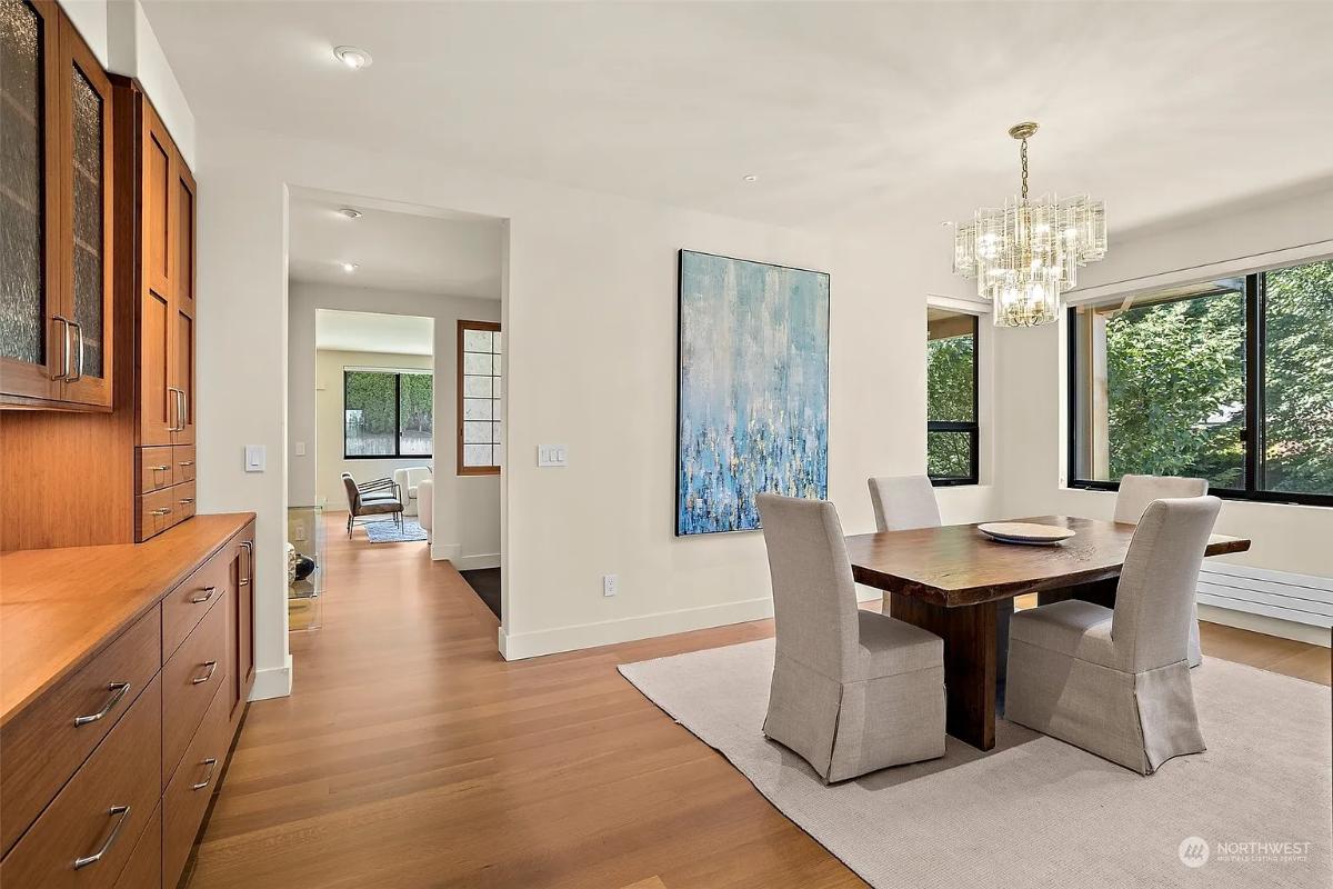 Dining room with a chandelier.