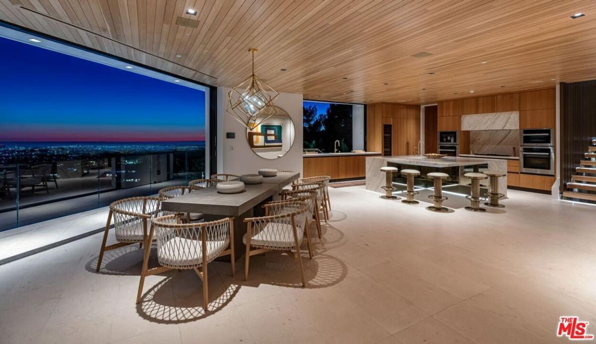 Dining room with a large wood table.