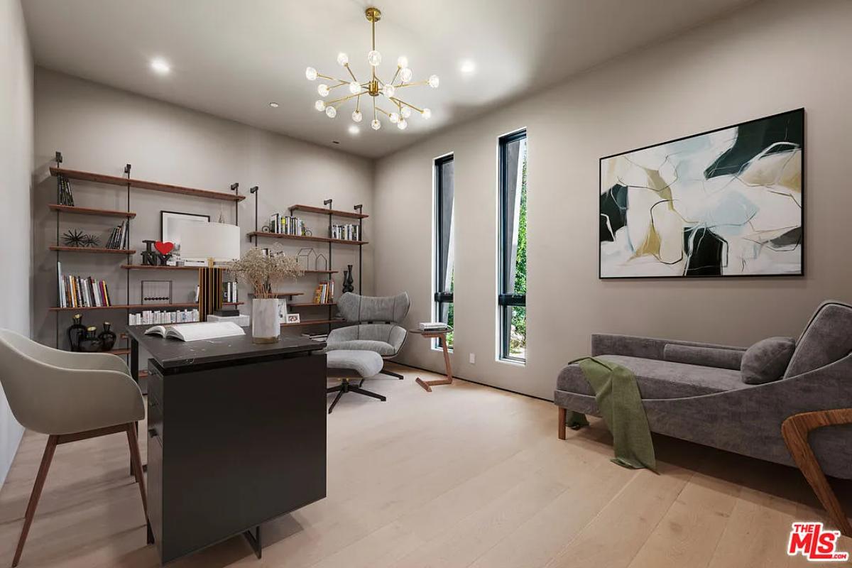 Home office with hardwood floors.