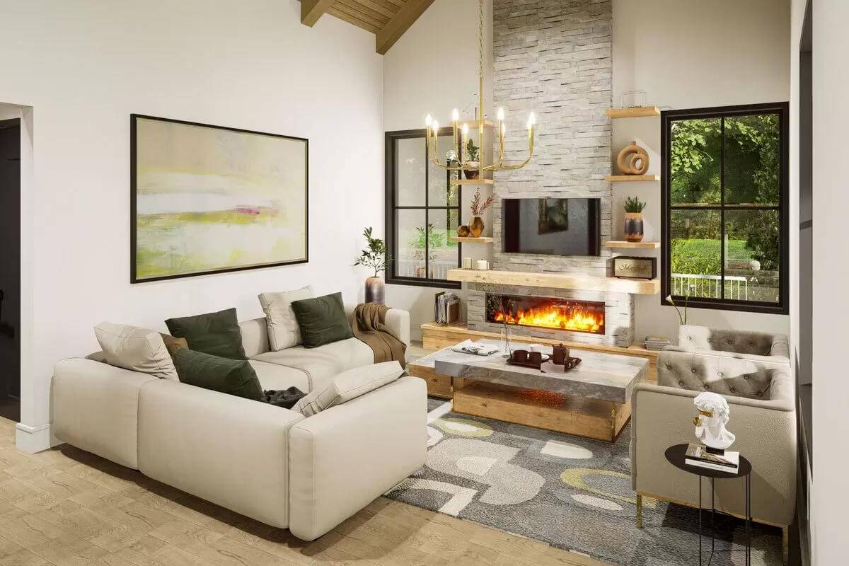 Living room with an L-shaped sectional, tufted chairs, and a stone fireplace.