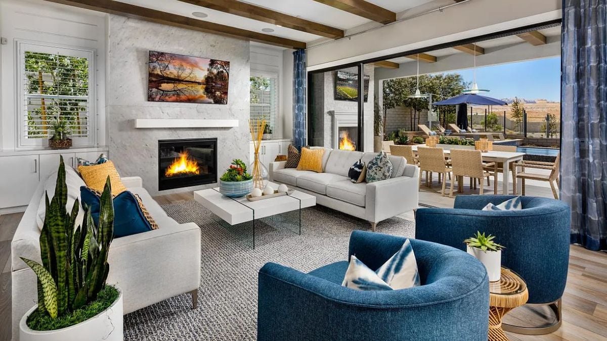 A great room with a living area and dining area.