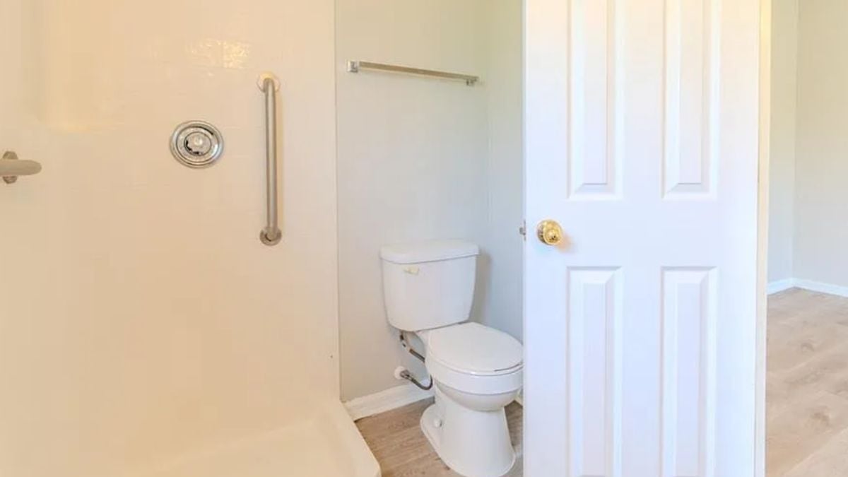 A bathroom with a toilet.