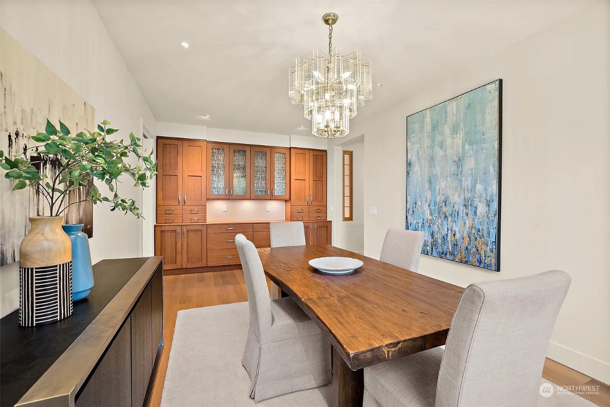 Dining room with a chandelier.
