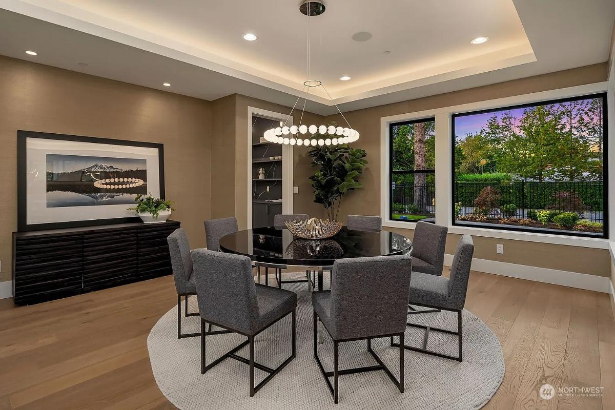 Formal dining room with a round table.