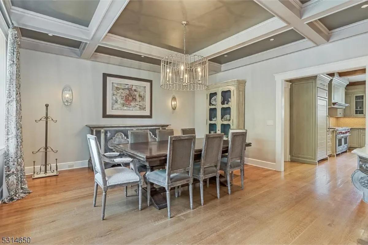 Dining room with a chandelier.