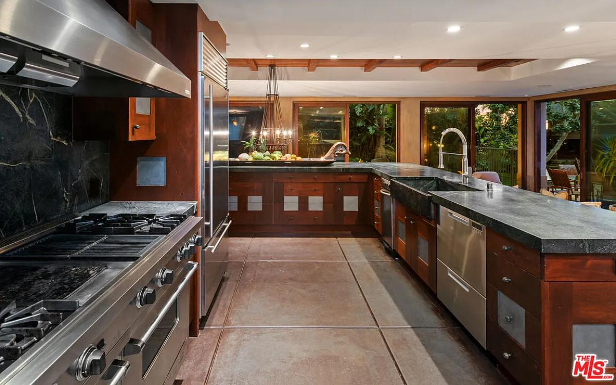 Kitchen with stainless-steel appliances.