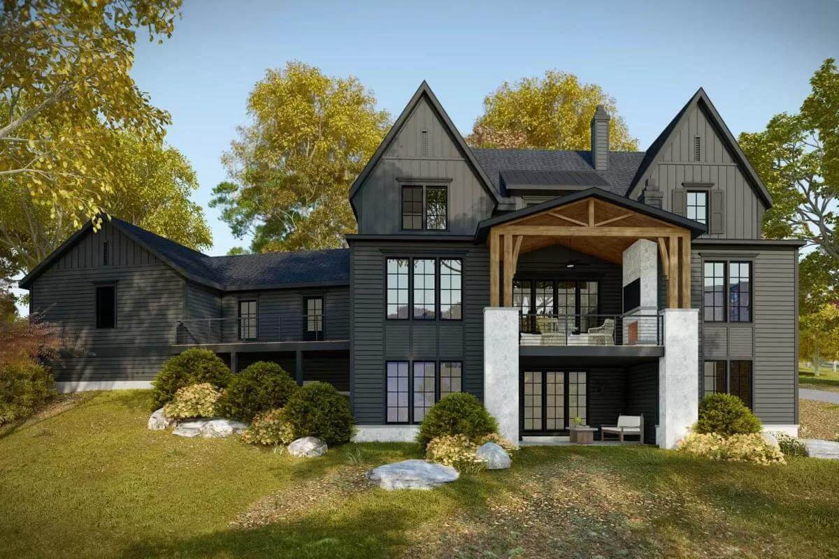 Rear view with large windows and stacked porches.