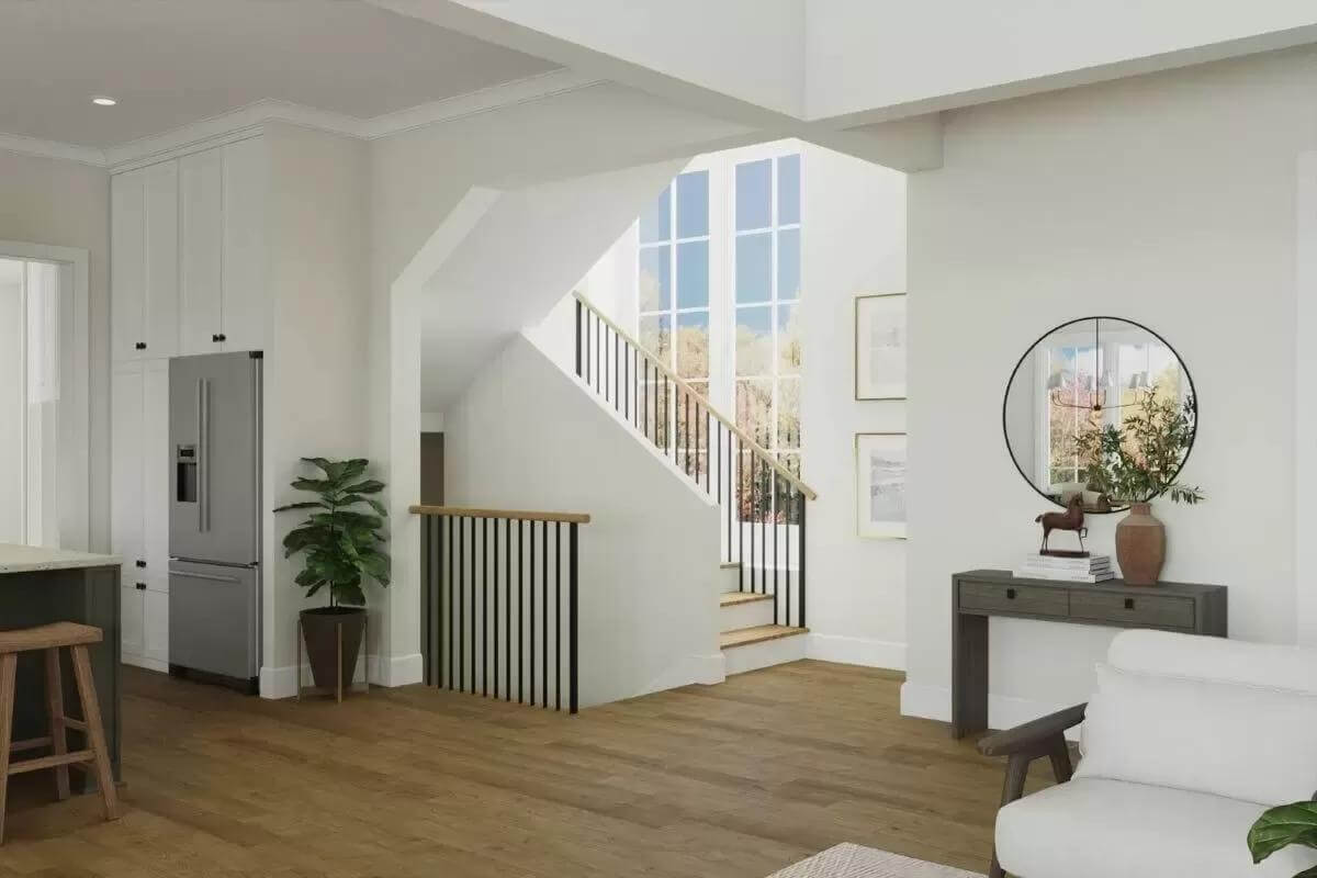 Staircases off the living space leading to the basement and upstairs bedrooms.