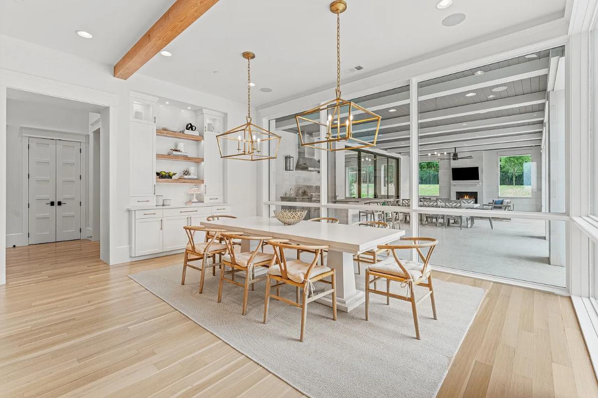 Dining room with a large table and chairs.