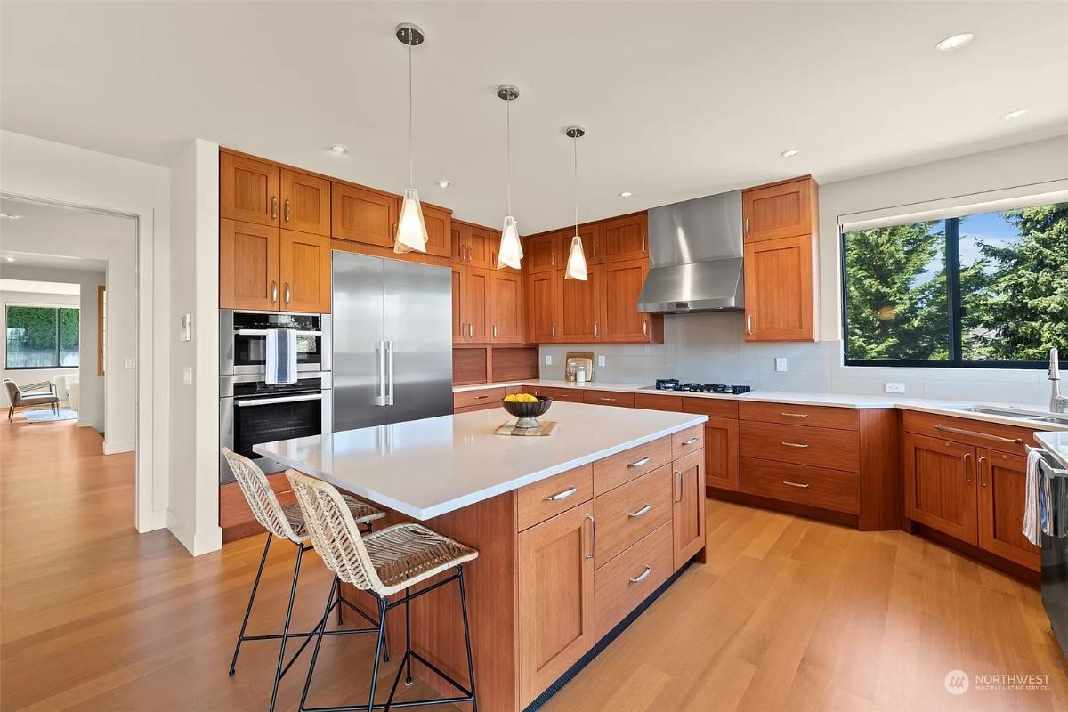 Kitchen with custom cabinetry and a center island prep area.